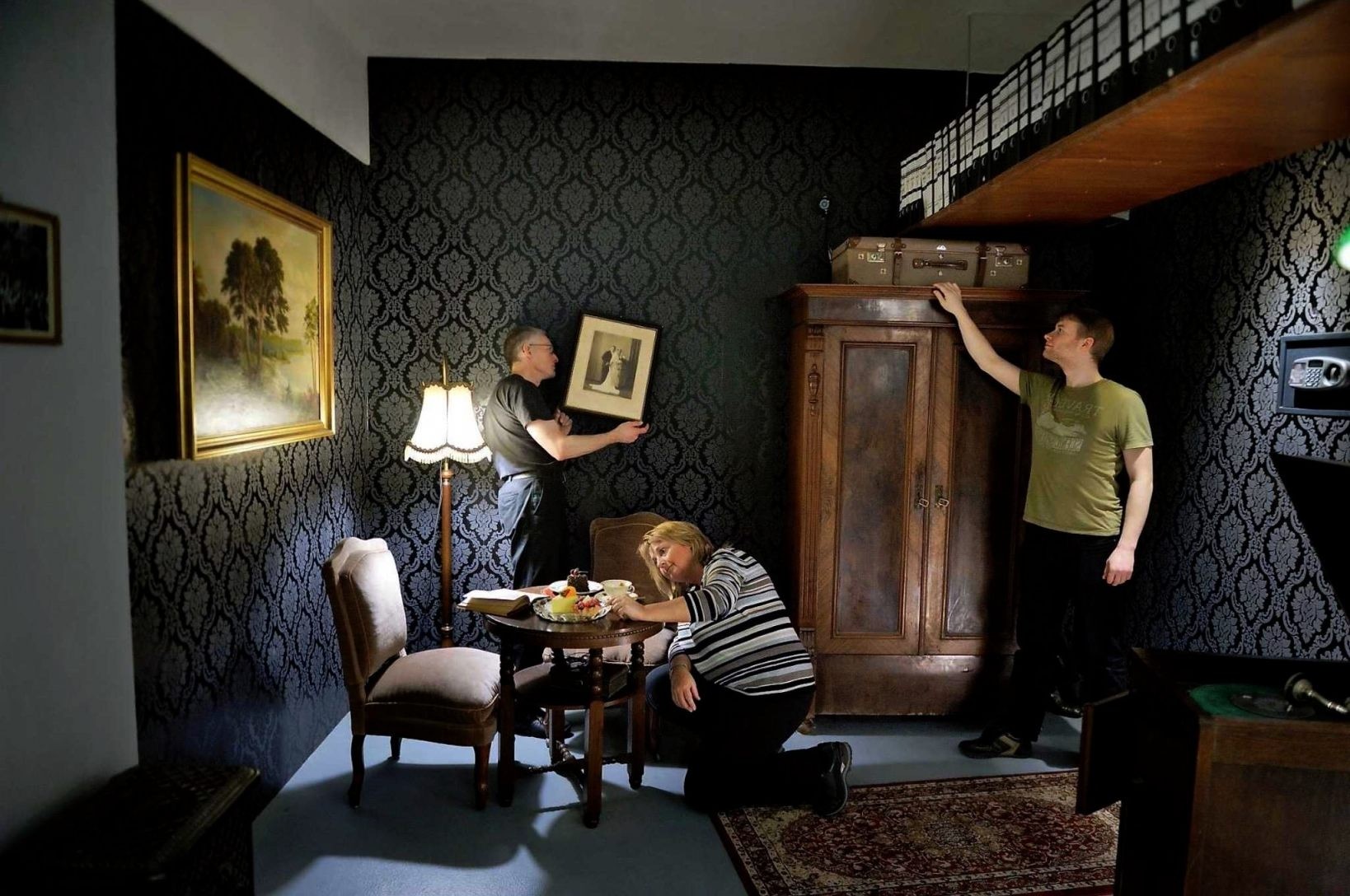 Players exploring an escape room